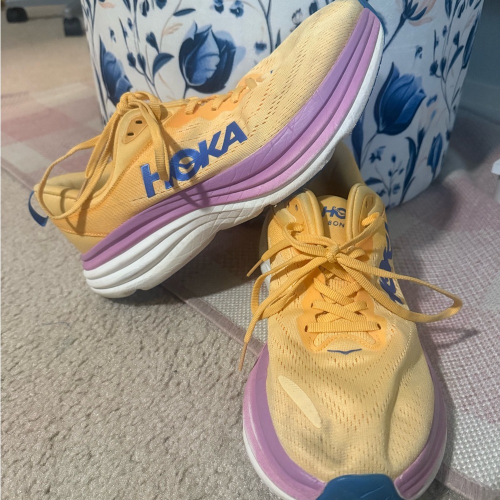 Hoka Women’s Yellow Running Shoes with Purple Midsole and Blue Logo